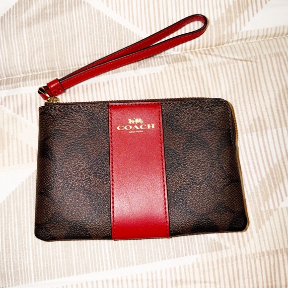 Coach Handbags - Coach Signature Dark Brown and Red Wristlet NWT